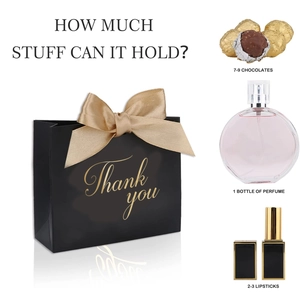 Sac cadeau noir avec ruban doré et guide de capacité pour parfums et cosmétiques