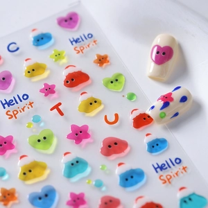 Cute 3D relief nail stickers with colorful hearts and stars on white manicured nails