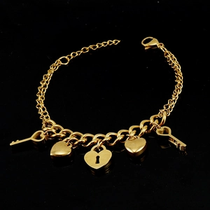 Bracelet pour femme en acier inoxydable doré 18K avec breloques cœur et clé