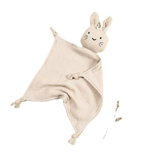 Beige cotton gauze baby security blanket with cute stuffed bunny head and knotted corners