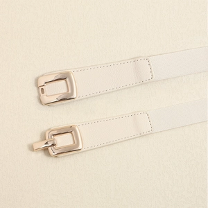 Elegant cream elastic waist belt for women with golden buckle and sleek leather ends