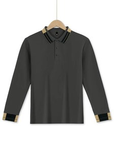 Detail of dark gray polo shirt featuring striped collar and pique cotton texture