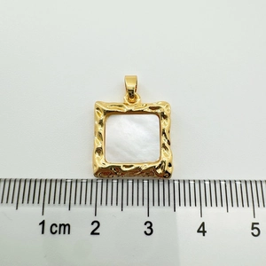 Detail of 18K gold-plated square pendant with white shell inlay and 1.5cm measurement