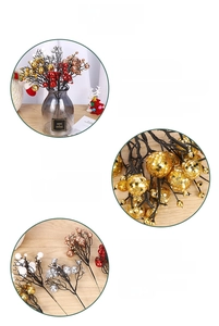 Detailed view of handcrafted metallic Christmas berry picks for festive tree and wreath decor