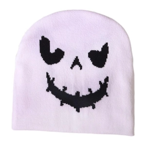 White Halloween beanie with black pumpkin ghost face pattern in soft knit fabric