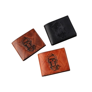 Vintage men's bifold short wallets with embossed skull pattern in three leather colors
