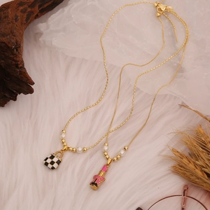 Golden titanium steel necklaces with pink lipstick and checkerboard bag pendants and pearls