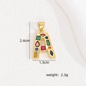 Detailed view of the gold letter A pendant with dimensions 1.5cm by 2.4cm and weight 2.3g