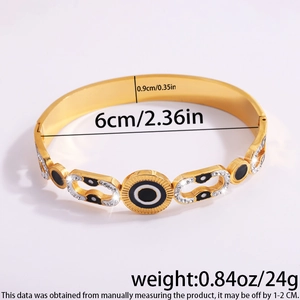 Detailed dimensions of gold evil eye bangle showing 0.9cm width and 6cm inner diameter