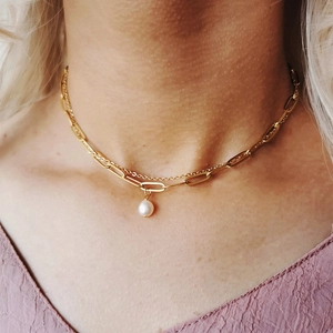 Double-layered gold stainless steel necklace featuring a baroque freshwater pearl pendant