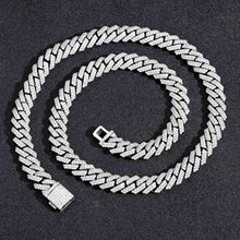 Close-up of 10mm silver Cuban link chain bracelet with micro-paved white zircons and box clasp