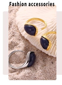 Macro detail of gold and silver resin rings on white coral with blue stones