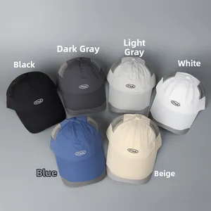 Detail view of quick-dry baseball caps in six colors with mesh panels and Mad logo