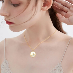 Gold stainless steel mustard seed faith necklace with mountain and sun pendant for women