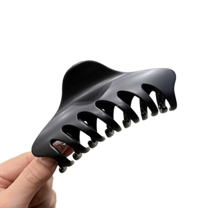 Matte black 12cm butterfly claw clip for thick hair shown on a clean white background