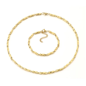 Minimalist gold stainless steel twisted chain necklace and bracelet set on white background