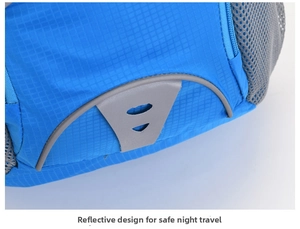 Detail of blue outdoor backpack featuring grey mesh pocket and reflective safety stripe