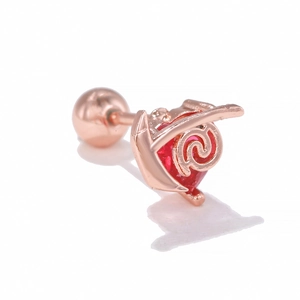 Rose gold heart-shaped stud with red stone inlay and decorative filigree details