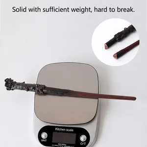Solid resin magic wand cosplay prop displayed on a scale showing 45.8g weight