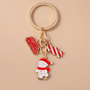 Detailed view of Christmas keychain with snowman candy charms and Merry Christmas tag