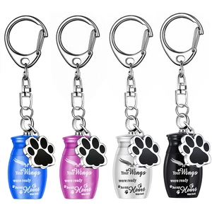 Pet memorial urn keychains in four colors with paw charms and wings engraving
