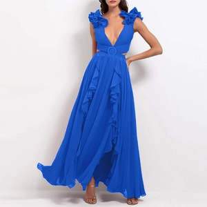 Detail of blue cutout swimsuit with 3D floral shoulders and ruffled skirt layers