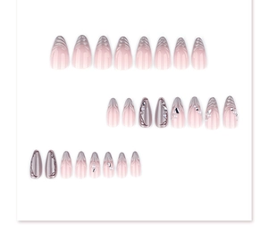 Detailed flat lay of pink cat-eye press-on nails with 3D water ripples and pearls