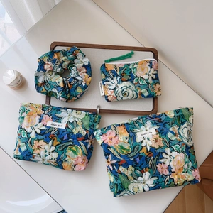 Floral cotton pouch set with scrunchie and zipper wallets in blue and green oil painting style