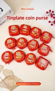 Macro detail of festive Year of the Horse tinplate coin purses with zodiac illustrations