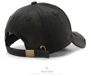 Detailed back view of distressed black baseball cap with bronze metal buckle