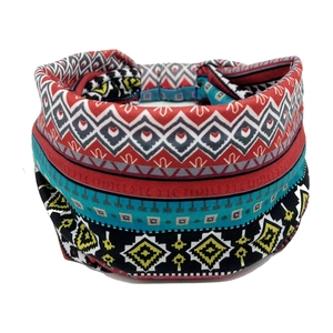 Close-up detail of bohemian geometric pattern on elastic ethnic style sports headband