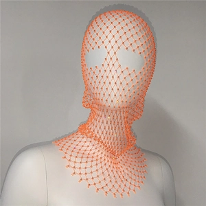 Detail of neon orange rhinestone mesh mask with elastic net structure for festivals
