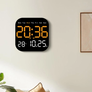 Modern black wall clock with orange and white LED display for time, date and temperature