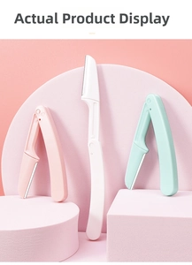Three safety folding eyebrow razors in pink, white, and mint green on display stands
