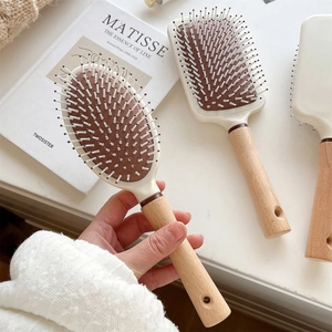 Minimalist wooden paddle hairbrush with beech handle and anti-static air cushion bristles