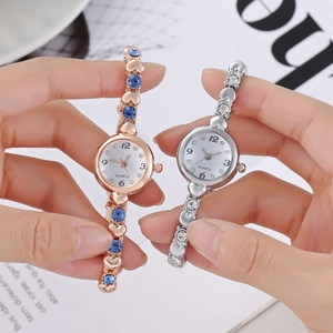 Women's heart-shaped crystal link watches in rose gold and silver metallic finish