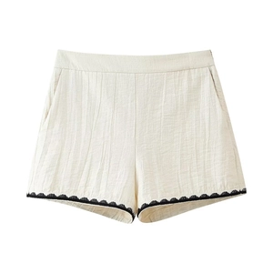 Women's cream pleated casual shorts with black geometric embroidery and high waist