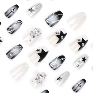 Black and silver Y2K press-on nails with 3D crown rhinestones and star patterns