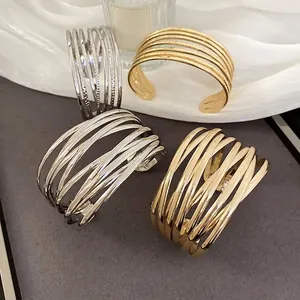 Minimalist multi-layer hollow open bangle in gold and silver finish for fashion jewelry