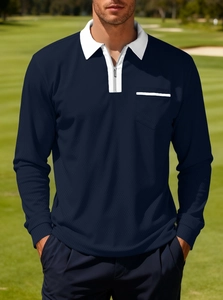 Men's navy long sleeve polo shirt with white trim and zip collar at golf course
