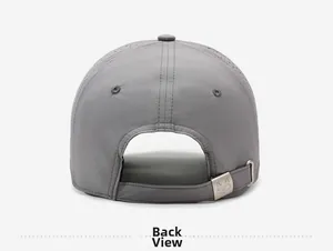 Detail view of the gray quick-dry baseball cap with metal buckle and fox logo on the back