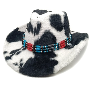 Faux fur cowboy hat with cow print and ethnic beaded band in a classic western style