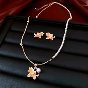Zircon pearl Pegasus pendant necklace and earrings set with asymmetric gold chain