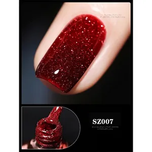 Sparkling red reflective glitter gel nail polish with a high-shine diamond effect finish