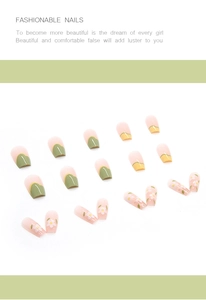 Detail view of 24pcs short square press-on nails with green yellow floral patterns