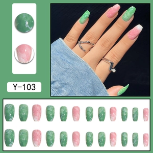 Short coffin press on nails featuring green and pink marble patterns with gold line accents