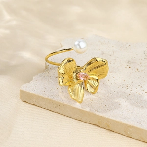 French vintage 18k gold plated bow ring with pink gemstone, pearl and open band design