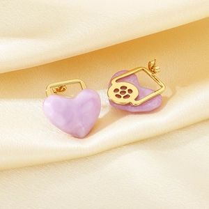 Pastel lavender marble heart earrings with 18K gold plated trim on silk fabric