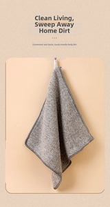 Close-up of thick microfiber cleaning cloth in dark gray with a white hanging loop