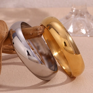 Minimalist thick polished 18K gold and silver stainless steel bangles for women